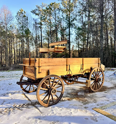 During a green burial at Potts Mountain Burial Ground in Pickens County, Georgia the deceased will arrive via hearse in a biodegradable wicker casket. The body will be transferred to our antique cart for transporting up the mountain to the burial site. Mourners are invited to walk behind and accompany the cart to the grave.
